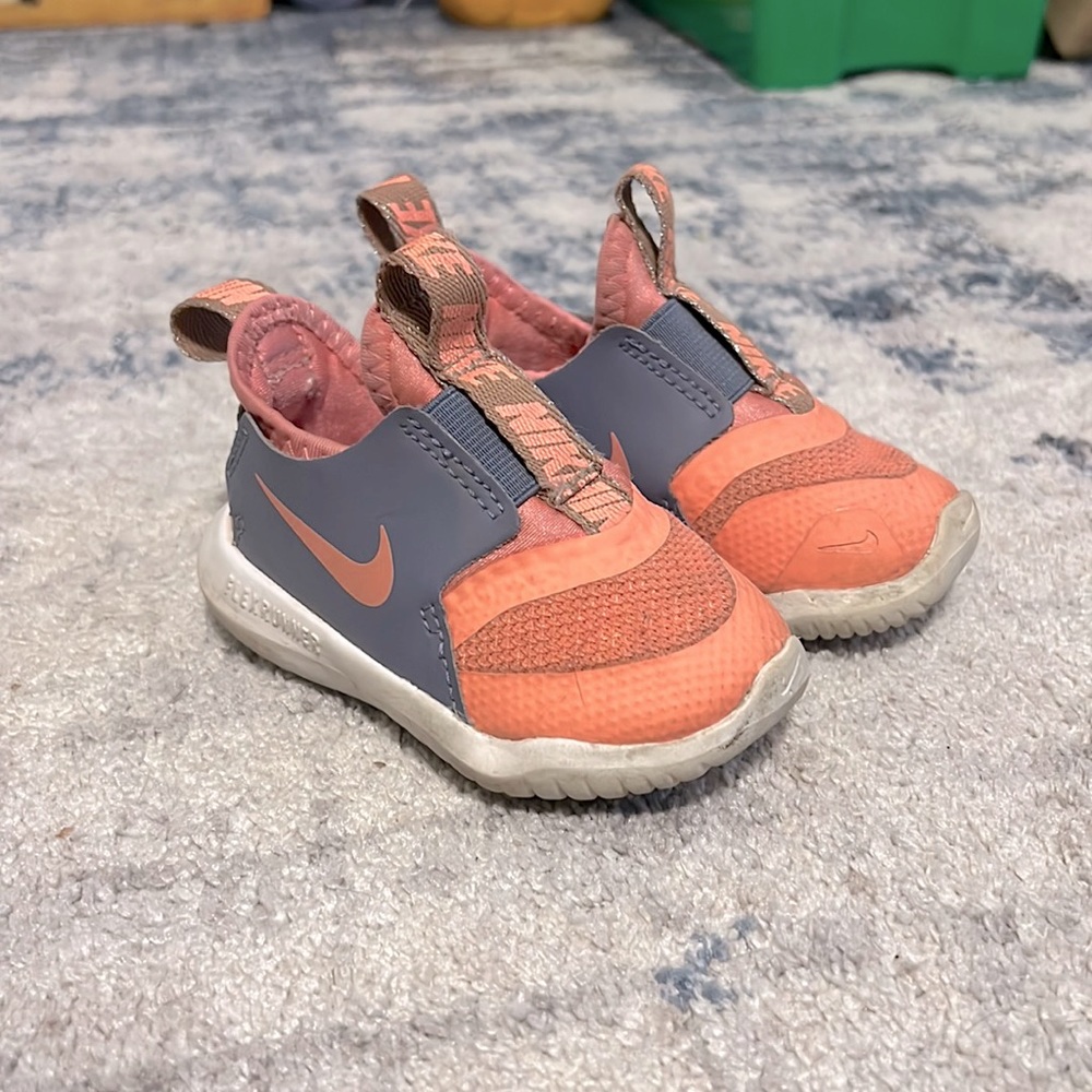 Well worn baby Nikes
